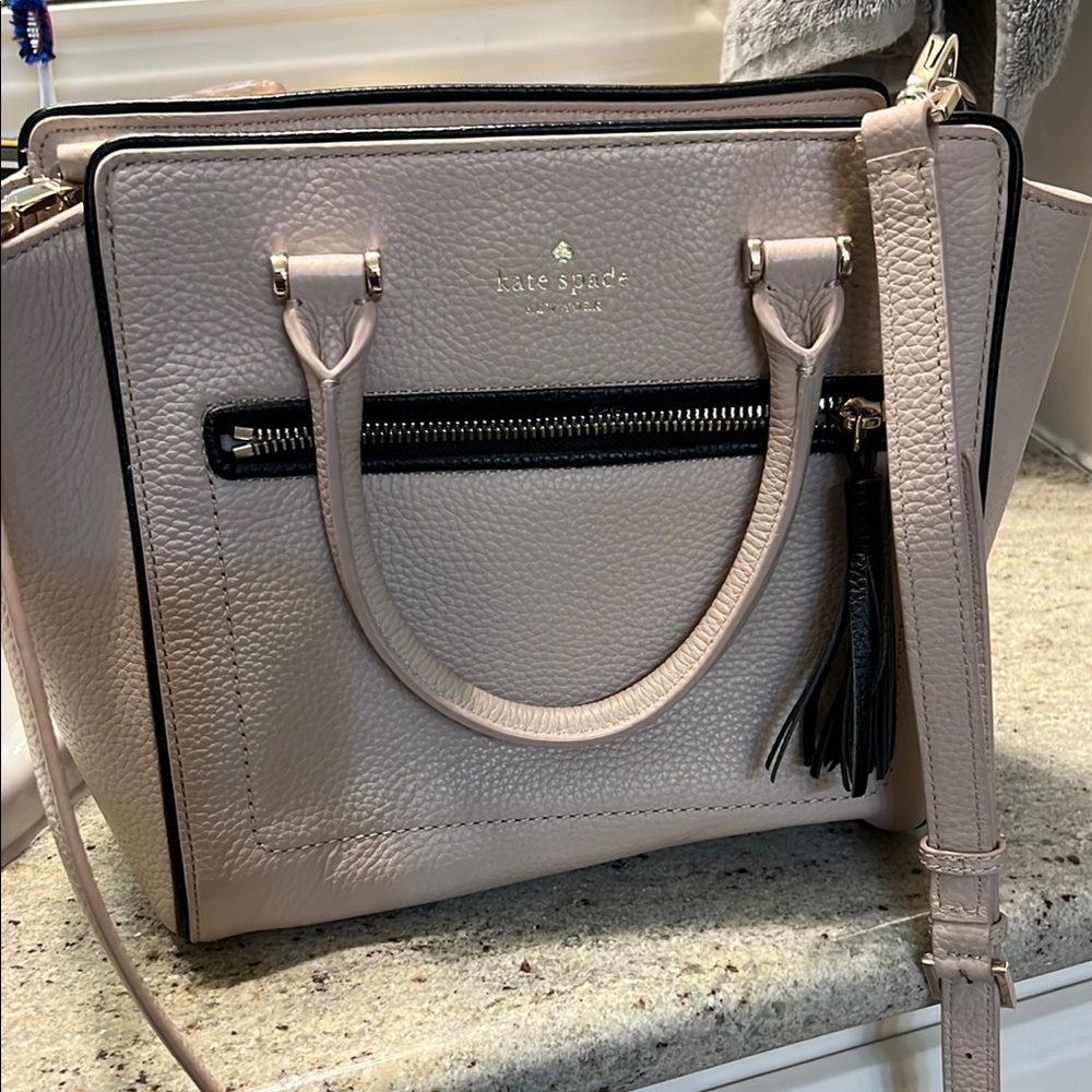 Kate Spade Cream Satchel with Structured Design and Adjustable Strap